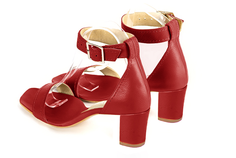 Scarlet red women's closed back sandals, with a strap around the ankle. Square toe. Medium block heels. Rear view - Florence KOOIJMAN